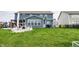 Large, well-maintained backyard featuring a concrete patio and lush green grass perfect for relaxing at 3164 Kent Dr, Brownsburg, IN 46112