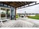 Beautiful backyard features a pond view, a patio, and outdoor seating for relaxation at 3164 Kent Dr, Brownsburg, IN 46112