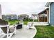 Expansive backyard features a fire pit with comfortable seating perfect for gatherings with friends at 3164 Kent Dr, Brownsburg, IN 46112