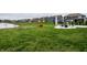 Spacious backyard with lush green grass offers plenty of room to play at 3164 Kent Dr, Brownsburg, IN 46112