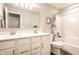Modern bathroom with dual sinks, quartz counters and a shower-tub combination at 3164 Kent Dr, Brownsburg, IN 46112