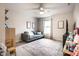 Cozy bedroom with a comfortable sofa, natural light, and minimalist decor at 3164 Kent Dr, Brownsburg, IN 46112