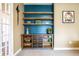 Custom built-in shelves with decor create a focal point in this inviting home office at 3164 Kent Dr, Brownsburg, IN 46112