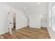 Bedroom featuring hardwood floors, trim, window, and closet at 324 W 7Th St, Anderson, IN 46016