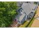 Aerial view showcasing the home's backyard deck and mature trees at 325 E 10Th St, Indianapolis, IN 46202