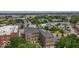 The image highlights historic brick buildings with modern amenities at 325 E 10Th St, Indianapolis, IN 46202