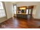 Bright kitchen with an island, stainless steel appliances and hardwood floors at 325 E 10Th St, Indianapolis, IN 46202