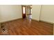 Bright living room features hardwood floors and neutral paint at 325 E 10Th St, Indianapolis, IN 46202