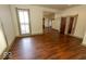 Open-concept living room with hardwood floors and ample natural light at 325 E 10Th St, Indianapolis, IN 46202