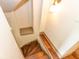 Wooden staircase leading to the second floor, bathed in natural light at 325 E 10Th St, Indianapolis, IN 46202
