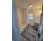 Clean bathroom with a tiled shower and tub, modern vanity, and vinyl plank flooring at 3614 N Capitol Ave, Indianapolis, IN 46208