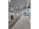 Bright kitchen with ample countertop space, a large stainless hood, and modern grey vinyl plank floors at 3614 N Capitol Ave, Indianapolis, IN 46208