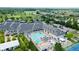 Aerial view of the clubhouse, pool, and surrounding recreation area at 3989 Birkdale Dr, Carmel, IN 46033