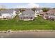 Aerial view highlighting the home's backyard and proximity to a scenic lake at 3989 Birkdale Dr, Carmel, IN 46033