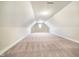 Spacious attic with clean carpet and neutral walls at 3989 Birkdale Dr, Carmel, IN 46033