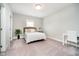 Bedroom featuring plush carpeting, light gray walls, and a comfortable queen bed at 3989 Birkdale Dr, Carmel, IN 46033