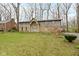 Charming home featuring a stone and siding facade with a well-manicured lawn at 4140 Melbourne Rd, Indianapolis, IN 46228