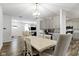 Open concept dining room flows into the kitchen, perfect for entertaining at 4221 Millersville Rd, Indianapolis, IN 46205