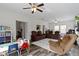 Open floor plan features multiple seating areas, recessed lighting and ceiling fans at 4221 Millersville Rd, Indianapolis, IN 46205