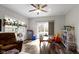 Bright playroom features large windows, shelving, and a sliding door to the backyard at 4221 Millersville Rd, Indianapolis, IN 46205
