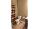 The bathroom features a toilet, shower with patterned curtain and tile flooring adding a touch of elegance at 452 Twin Oaks Dr, Carmel, IN 46032