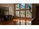 Inviting living room features large windows, hardwood floors, and comfortable seating at 452 Twin Oaks Dr, Carmel, IN 46032