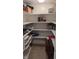 Pantry with white shelving provides ample storage space for kitchen essentials and household items at 452 Twin Oaks Dr, Carmel, IN 46032