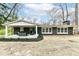 Backyard view of home showcasing a patio area for outdoor seating and entertaining at 4625 Berkshire Ln, Indianapolis, IN 46226