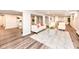 Basement living area featuring wood-look flooring, recessed lighting, and a comfortable seating arrangement at 4625 Berkshire Ln, Indianapolis, IN 46226