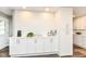 Bright kitchen features white cabinets and a modern coffee bar setup along a clean shiplap accent wall at 4625 Berkshire Ln, Indianapolis, IN 46226