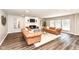 Inviting living room with a cozy fireplace and lots of natural light at 4625 Berkshire Ln, Indianapolis, IN 46226