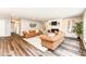 Spacious living room featuring hardwood floors and lots of natural light at 4625 Berkshire Ln, Indianapolis, IN 46226