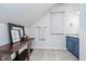 Unique bathroom featuring blue vanity with marble countertop, complemented by modern fixtures and stylish decor at 519 Southwind, Brownsburg, IN 46112