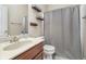 Bathroom featuring a vanity with a single sink and a shower with a gray curtain at 519 Southwind, Brownsburg, IN 46112