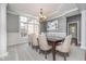 Elegant dining room featuring a chandelier and large window at 519 Southwind, Brownsburg, IN 46112