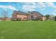 Charming two-story brick home with a large, well-maintained lawn at 519 Southwind, Brownsburg, IN 46112