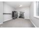 Flex room featuring neutral carpet and access to gym with a folding ping pong table at 519 Southwind, Brownsburg, IN 46112