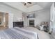 Main bedroom with a fireplace, seating area, and ensuite bathroom providing comfort and privacy at 519 Southwind, Brownsburg, IN 46112