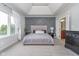 Main bedroom showcases a tray ceiling, accent wall, and ensuite bathroom access at 519 Southwind, Brownsburg, IN 46112