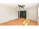Bedroom featuring hardwood floors, natural light, and ceiling fan at 5849 Brouse Ave, Indianapolis, IN 46220