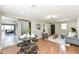 Bright living area showcases wood floors and neutral decor at 5849 Brouse Ave, Indianapolis, IN 46220