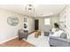 Cozy living room with modern light fixture and comfortable seating at 5849 Brouse Ave, Indianapolis, IN 46220