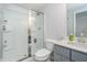 Clean bathroom with a glass-enclosed shower, a toilet, and gray vanity with solid surface counter top at 6027 Brentwood Trce, Brownsburg, IN 46112