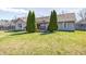 Backyard with a pergola over the back deck, and a freshly cut lawn at 6036 Maple Forge Cir, Indianapolis, IN 46254