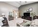 Inviting living room showcasing comfortable seating, TV, and seamless flow to other areas at 6036 Maple Forge Cir, Indianapolis, IN 46254
