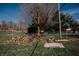 Woodpile and backyard, showing a functional space with lots of potential for outdoor activities at 6315 S Keystone Ave, Indianapolis, IN 46227