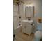 Bathroom with vanity and shower featuring a modern faucet and lighting fixtures at 6315 S Keystone Ave, Indianapolis, IN 46227