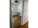 Bedroom with hardwood floors, a ceiling fan, and natural light streaming through the window at 6315 S Keystone Ave, Indianapolis, IN 46227