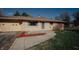Attractive one-story brick home featuring a well-manicured lawn and a spacious driveway at 6315 S Keystone Ave, Indianapolis, IN 46227