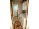 A well-kept laundry room featuring a washer, dryer, and storage cabinets at 6315 S Keystone Ave, Indianapolis, IN 46227